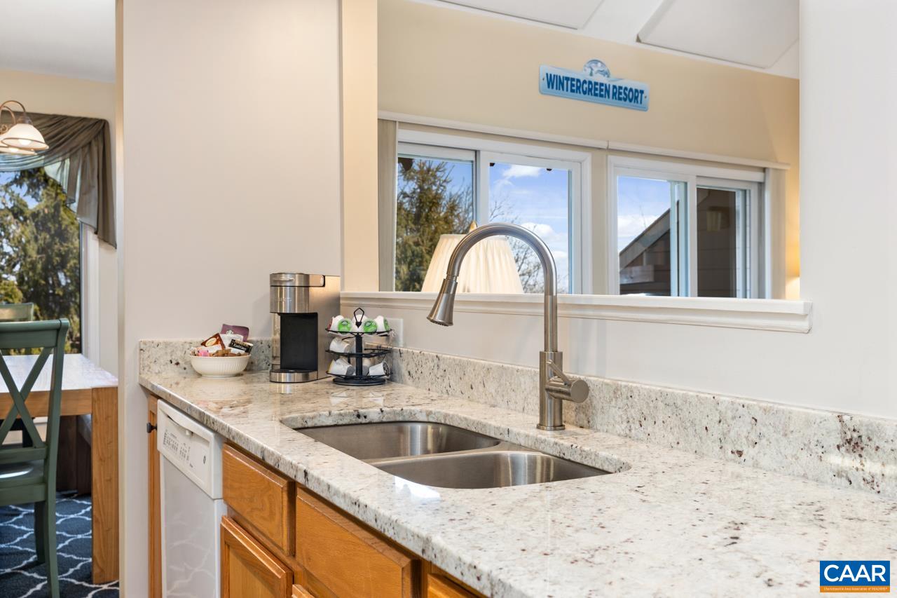 2078 Stone Ridge Roseland, VA 22967 - Photo 5 of 39 a kitchen with granite countertop a sink and a window