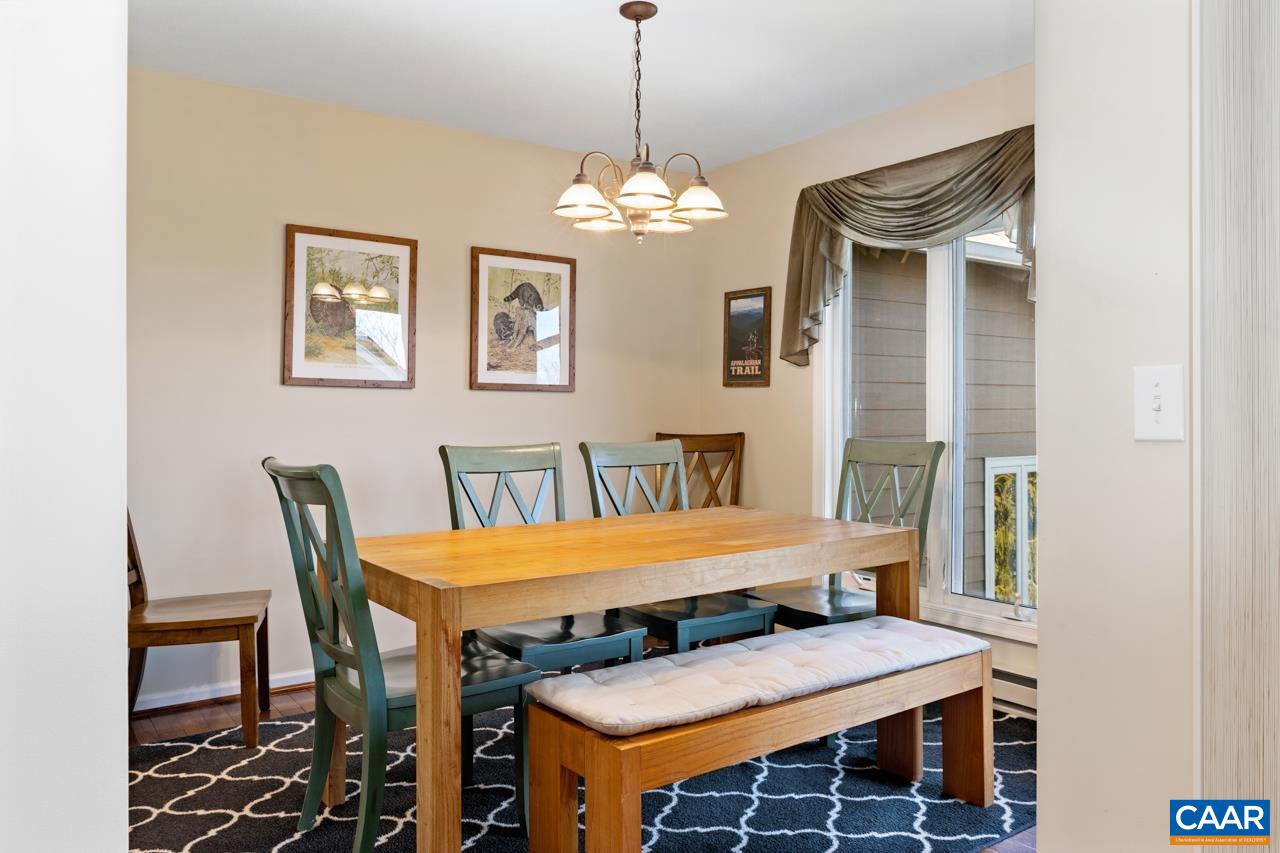 2078 Stone Ridge Roseland, VA 22967 - Photo 7 of 39 a view of a dining room with furniture and chandelier