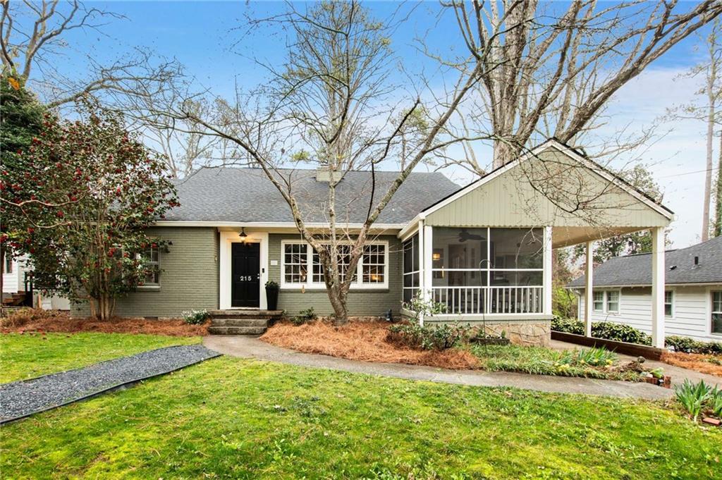 215 Coventry Road Decatur, GA 30030 - Photo 1 of 1 front view of a house with a yard