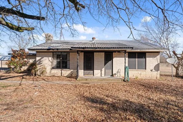 a house with yard in front of it