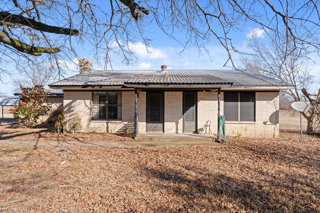 276 Point Tx 75472 Point, TX 75472 - Photo 18 of 18 a house with yard in front of it