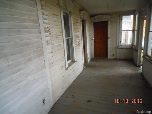 7151 West Hayner Road Fowlerville, MI 48836 - Photo 2 of 14 ENCLOSED PORCH.jpg
