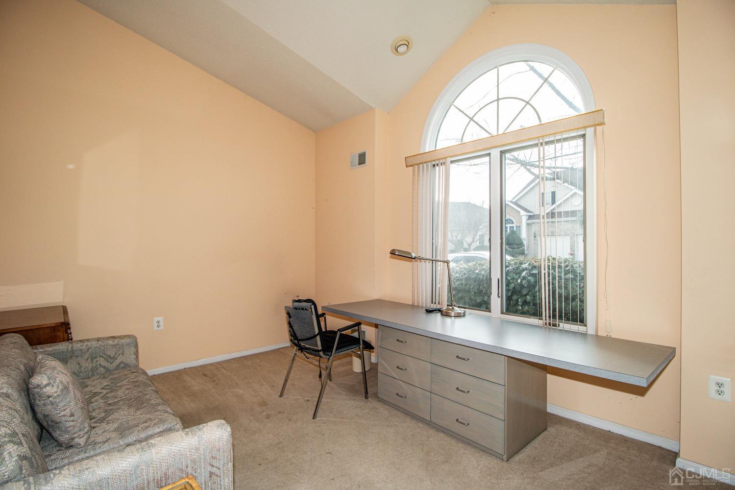 32 Harwood Road Monroe Township, NJ 08831 - Photo 21 of 34 a room with furniture and a window
