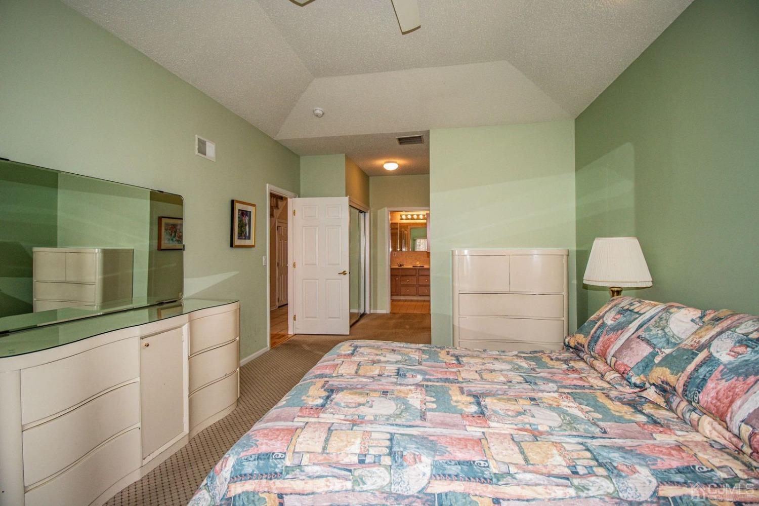 32 Harwood Road Monroe Township, NJ 08831 - Photo 25 of 34 a bedroom with a bed and a cabinets