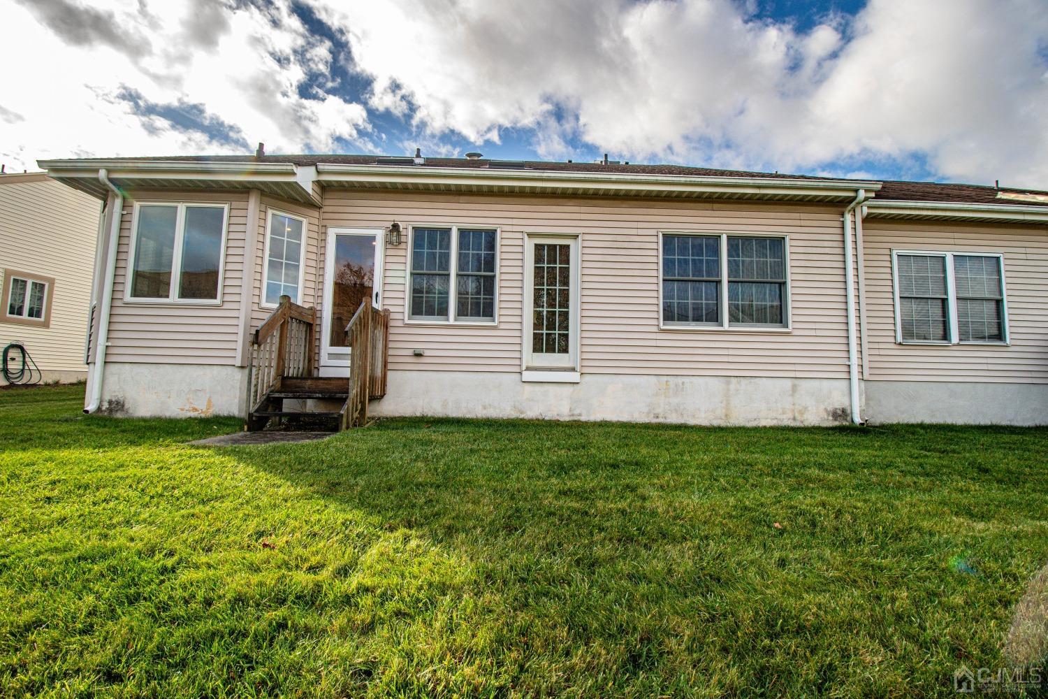 32 Harwood Road Monroe Township, NJ 08831 - Photo 34 of 34 front view of house with a yard