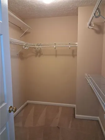 a view of a room with racks on the wall