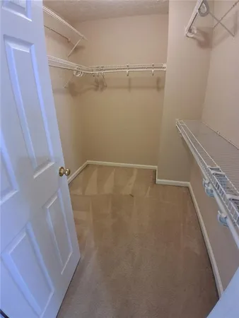 a view of a room with racks on the wall