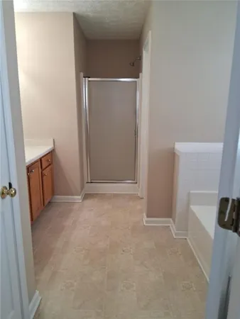 a bathroom with a sink a vanity and a mirror