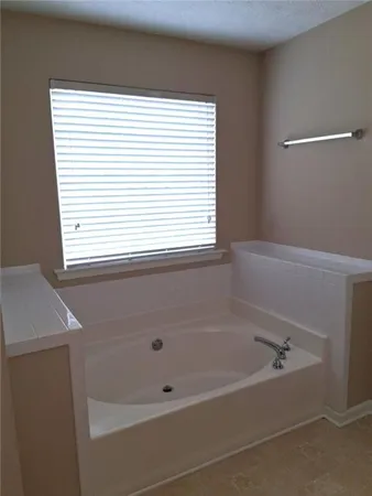 a bathroom with a bathtub