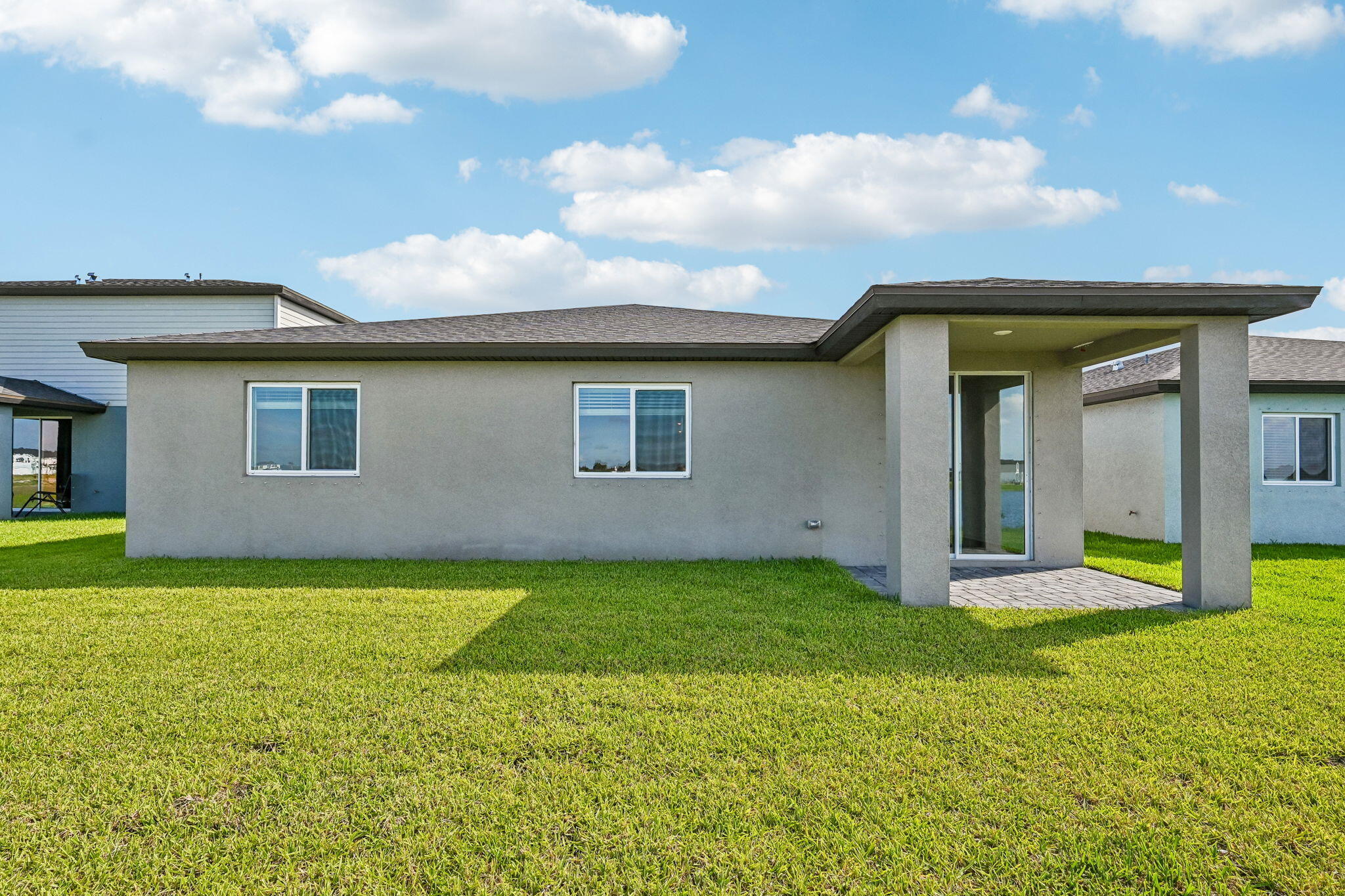 14503 Southwest New Dawn Road Indiantown, FL 34956 - Photo 34 of 42 a view of a house with backyard and garden