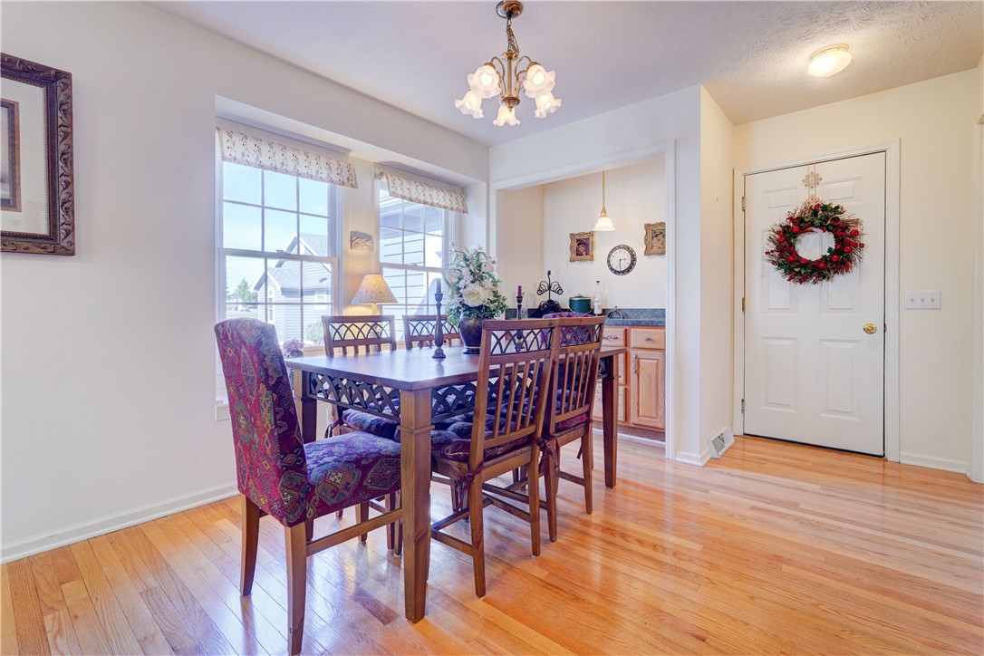 65 Cloverdale Street Rochester, NY 14612 - Photo 14 of 50 Natural light fills open dining area