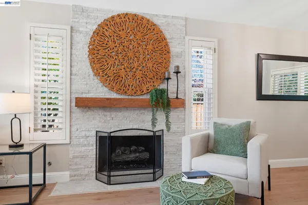 a dining room with table chairs and kitchen view