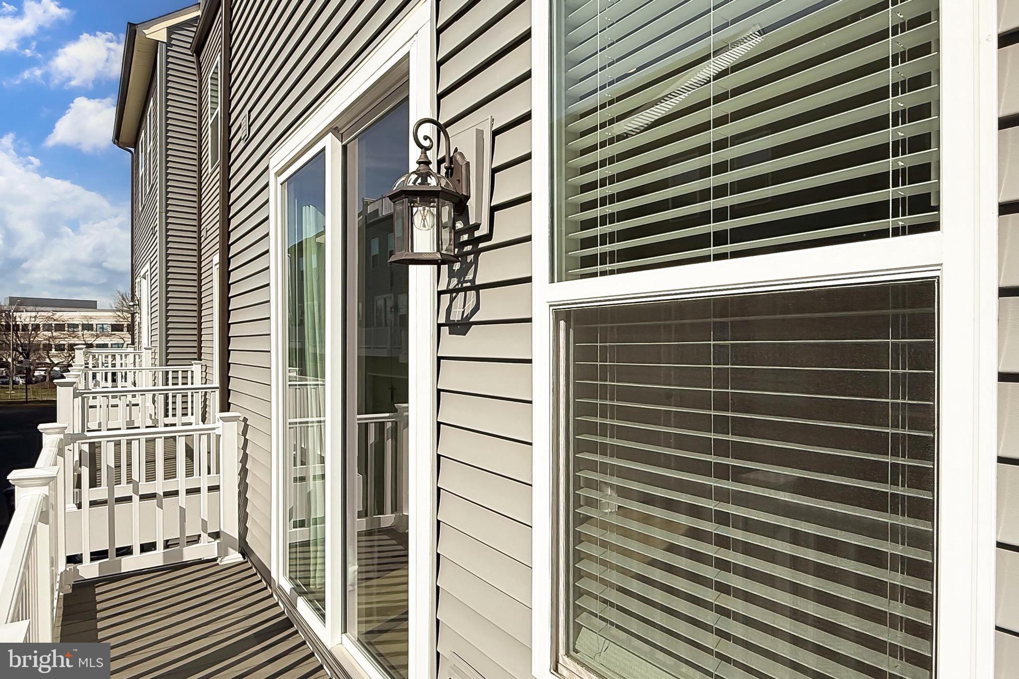 14176 Gypsum Loop Chantilly, VA 20151 - Photo 26 of 43 a view of a building from a street
