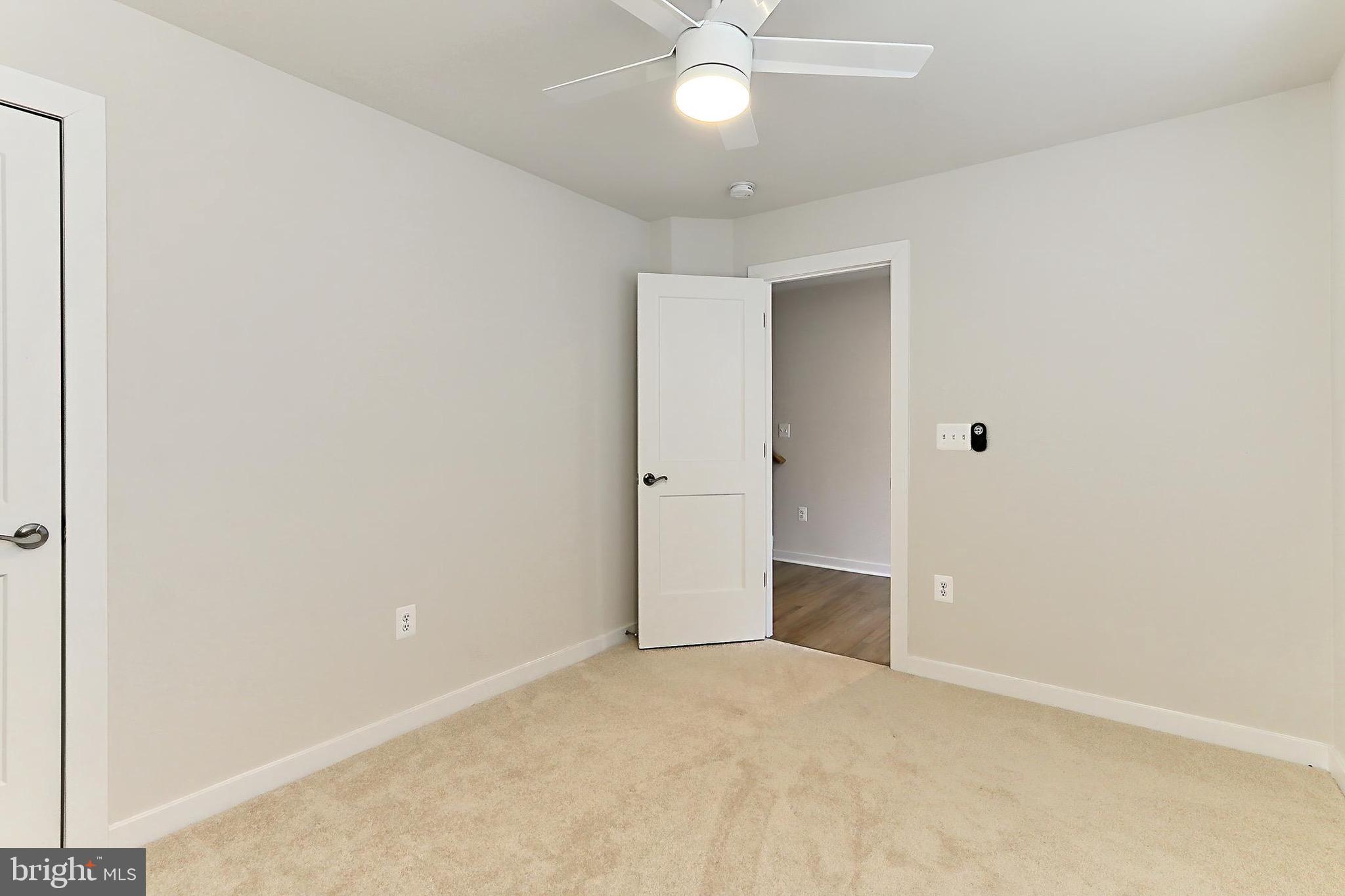 14176 Gypsum Loop Chantilly, VA 20151 - Photo 35 of 43 an empty room with a bathroom