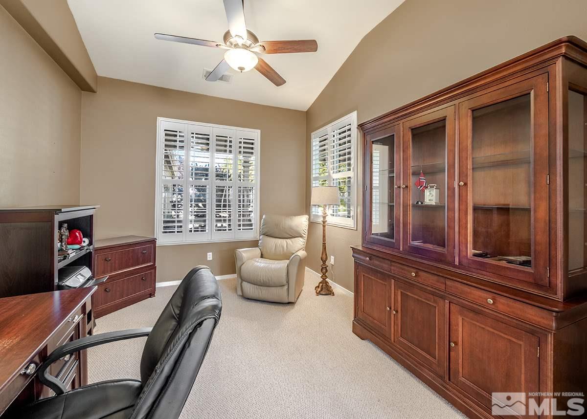 1408 Wild Wolf Way Reno, NV 89521 - Photo 13 of 24 a living room with furniture and a window
