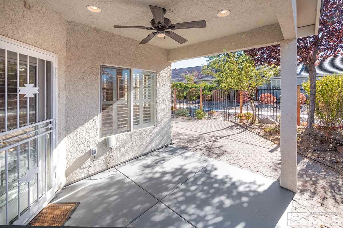 1408 Wild Wolf Way Reno, NV 89521 - Photo 18 of 24 a view of a porch and garden