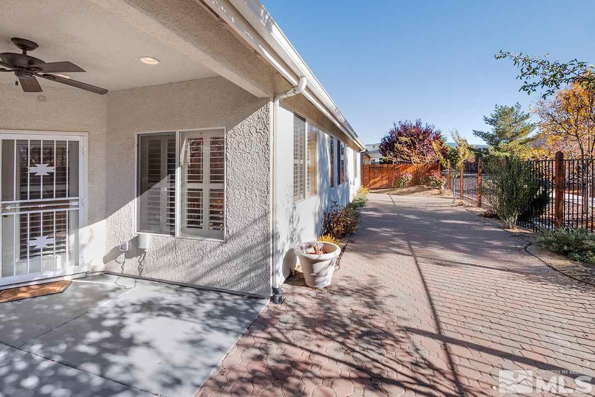 1408 Wild Wolf Way Reno, NV 89521 - Photo 19 of 24 a view of a house with a yard