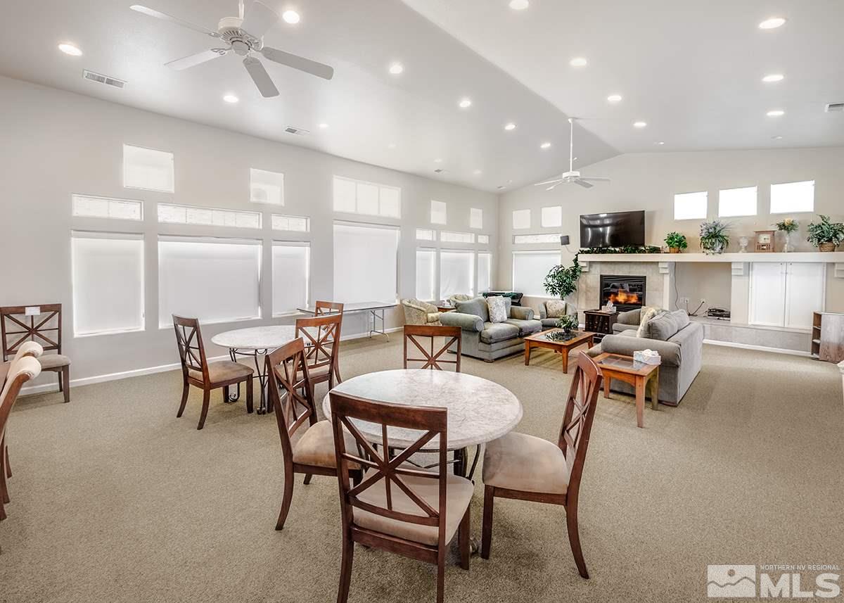 1408 Wild Wolf Way Reno, NV 89521 - Photo 22 of 24 a living room with furniture and kitchen view