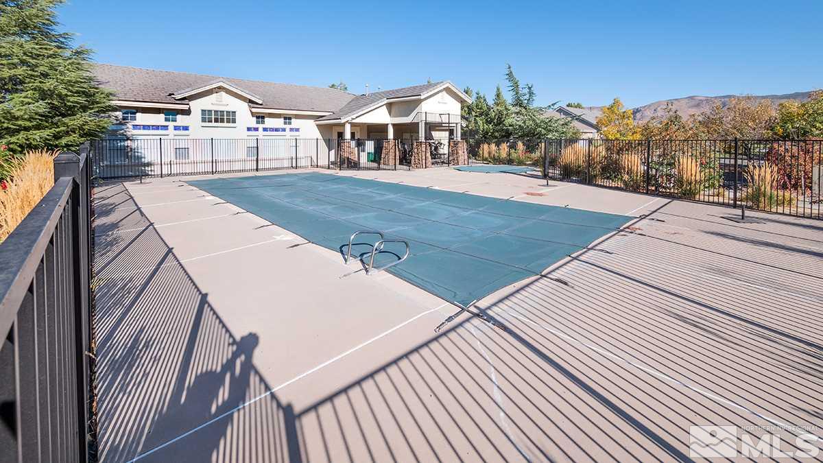 1408 Wild Wolf Way Reno, NV 89521 - Photo 23 of 24 a front view of a house with a yard
