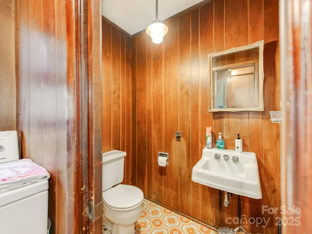 a bed room with a bed and a window