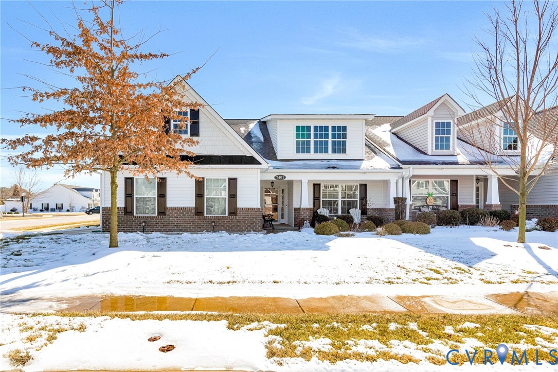 7401 Leaf Fall Way Mechanicsville, VA 23111 - Photo 1 of 48 a front view of a house with a yard covered with snow