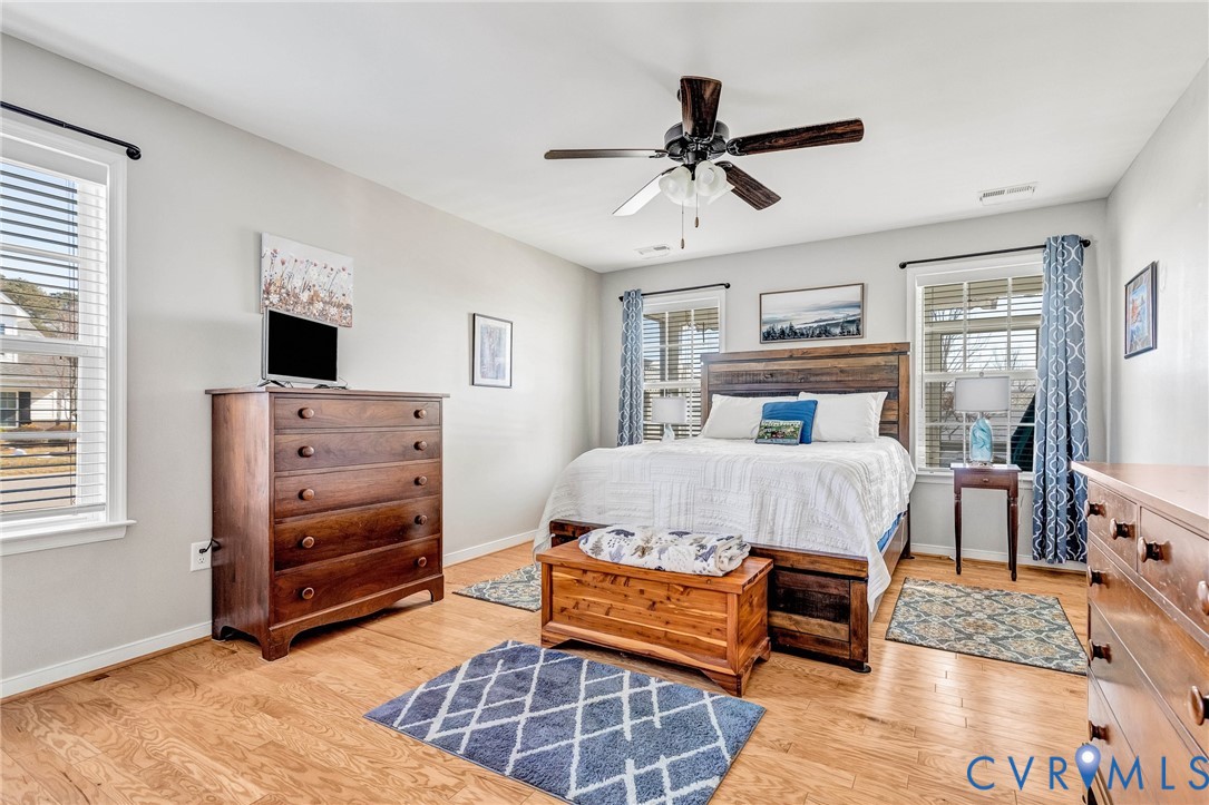 7401 Leaf Fall Way Mechanicsville, VA 23111 - Photo 19 of 48 a bedroom with a bed and furniture