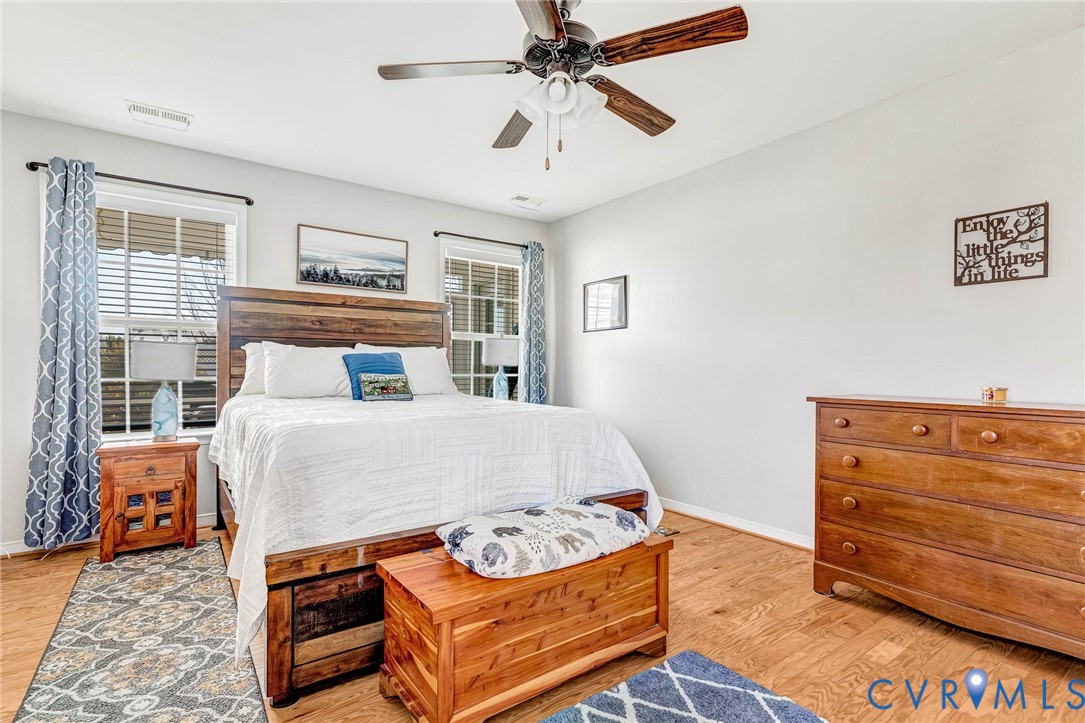 7401 Leaf Fall Way Mechanicsville, VA 23111 - Photo 20 of 48 a bedroom with a bed and window