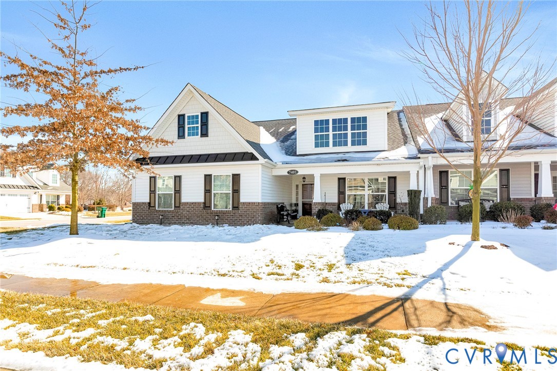 7401 Leaf Fall Way Mechanicsville, VA 23111 - Photo 2 of 48 a front view of a house with a yard covered with snow