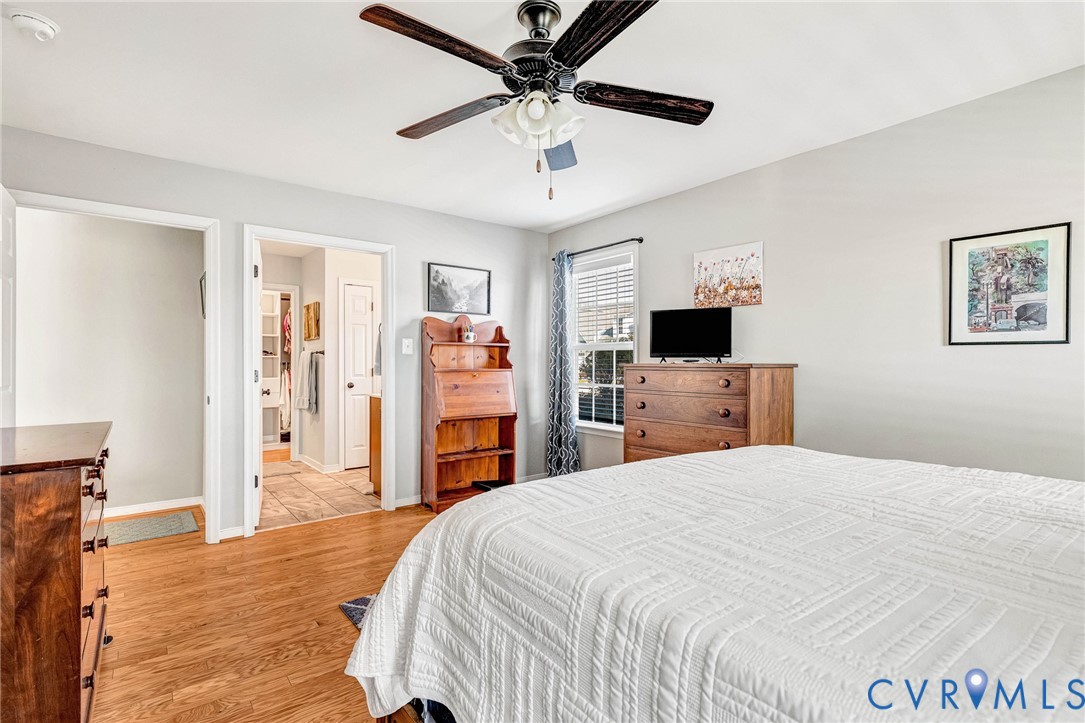 7401 Leaf Fall Way Mechanicsville, VA 23111 - Photo 21 of 48 a bedroom with a bed and a tv