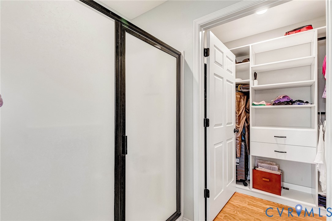 7401 Leaf Fall Way Mechanicsville, VA 23111 - Photo 24 of 48 a view of walk in closet with clothes and shoes