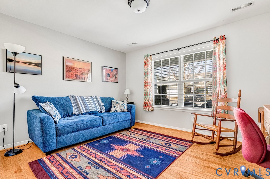 7401 Leaf Fall Way Mechanicsville, VA 23111 - Photo 26 of 48 a living room with furniture and a window