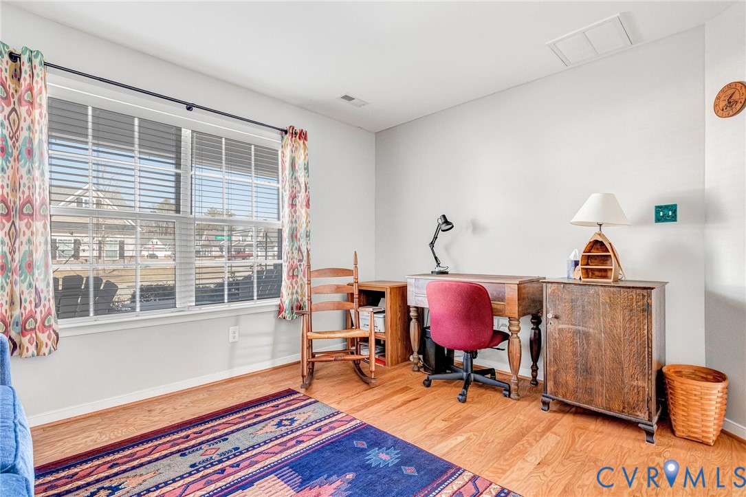 7401 Leaf Fall Way Mechanicsville, VA 23111 - Photo 27 of 48 a living room with furniture and a window