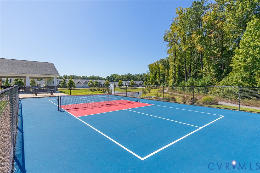 7401 Leaf Fall Way Mechanicsville, VA 23111 - Photo 47 of 48 a view of tennis court with large trees