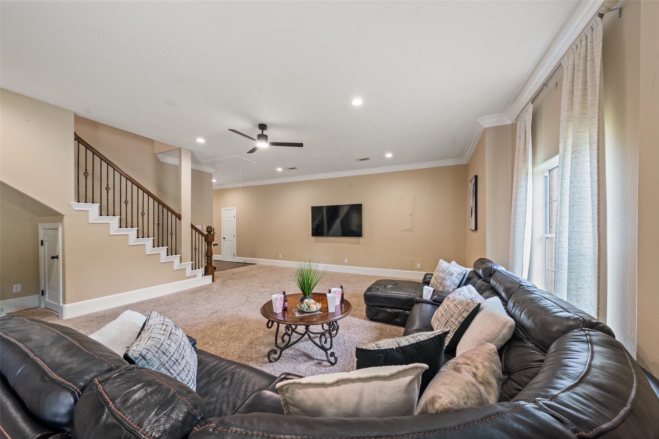 32660 Willow Bend Road Waller, TX 77484 - Photo 17 of 47 Expansive game or media room offering abundant space for comfortable seating, recreation, and entertainment.