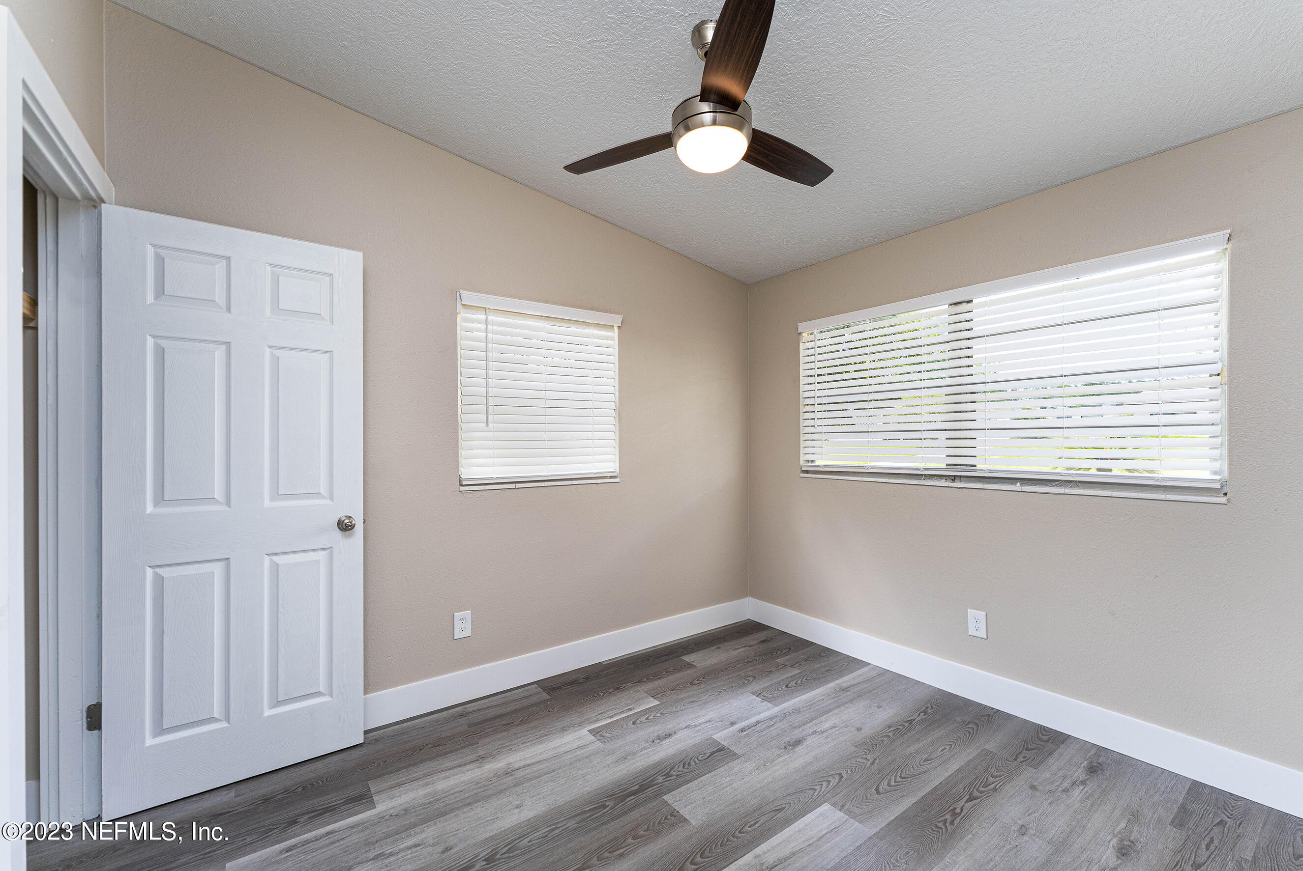 939 Westgate Drive Jacksonville, FL 32221 - Photo 22 of 31 a view of empty room with ceiling fan
