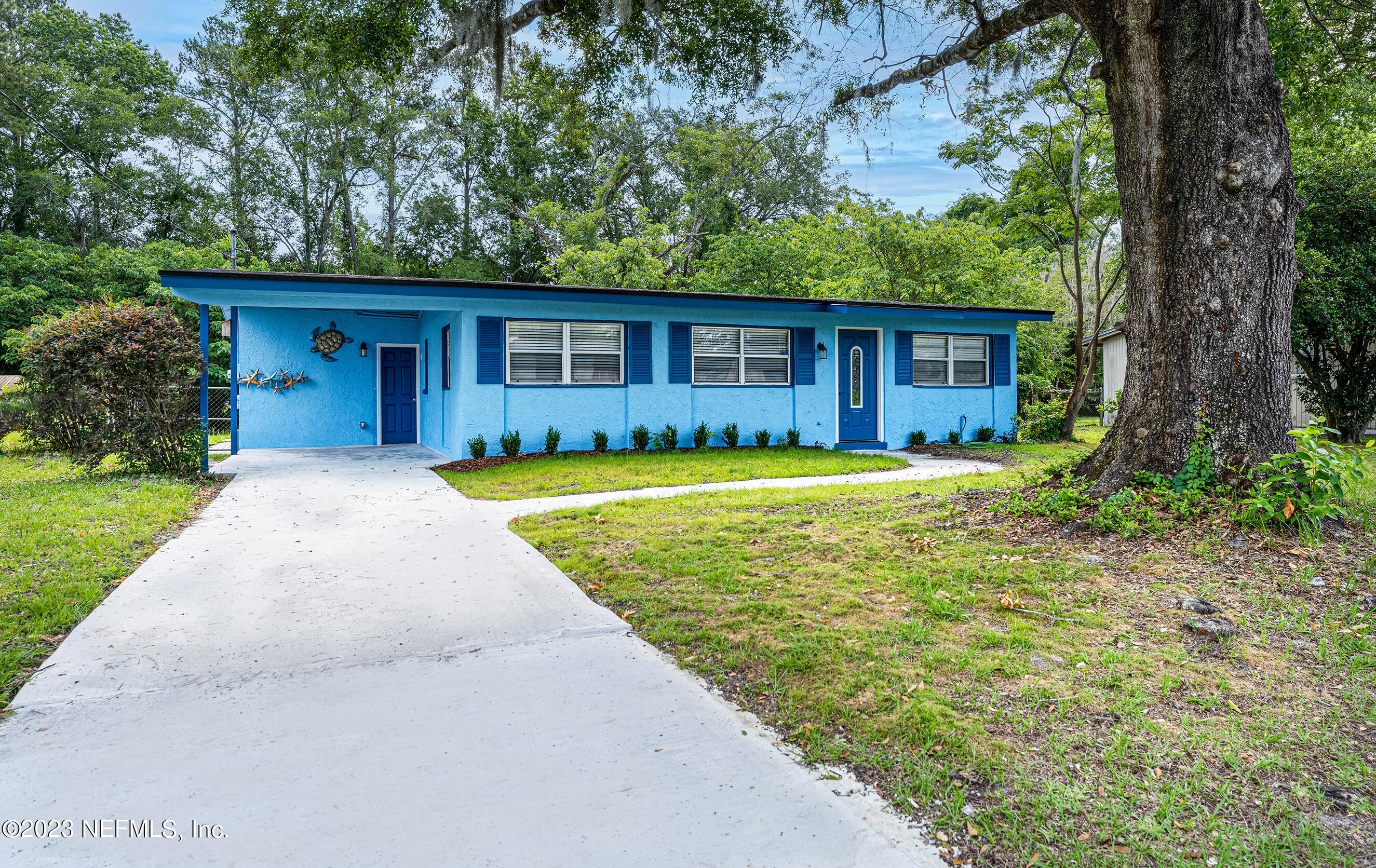 939 Westgate Drive Jacksonville, FL 32221 - Photo 24 of 31 a view of a house with a yard