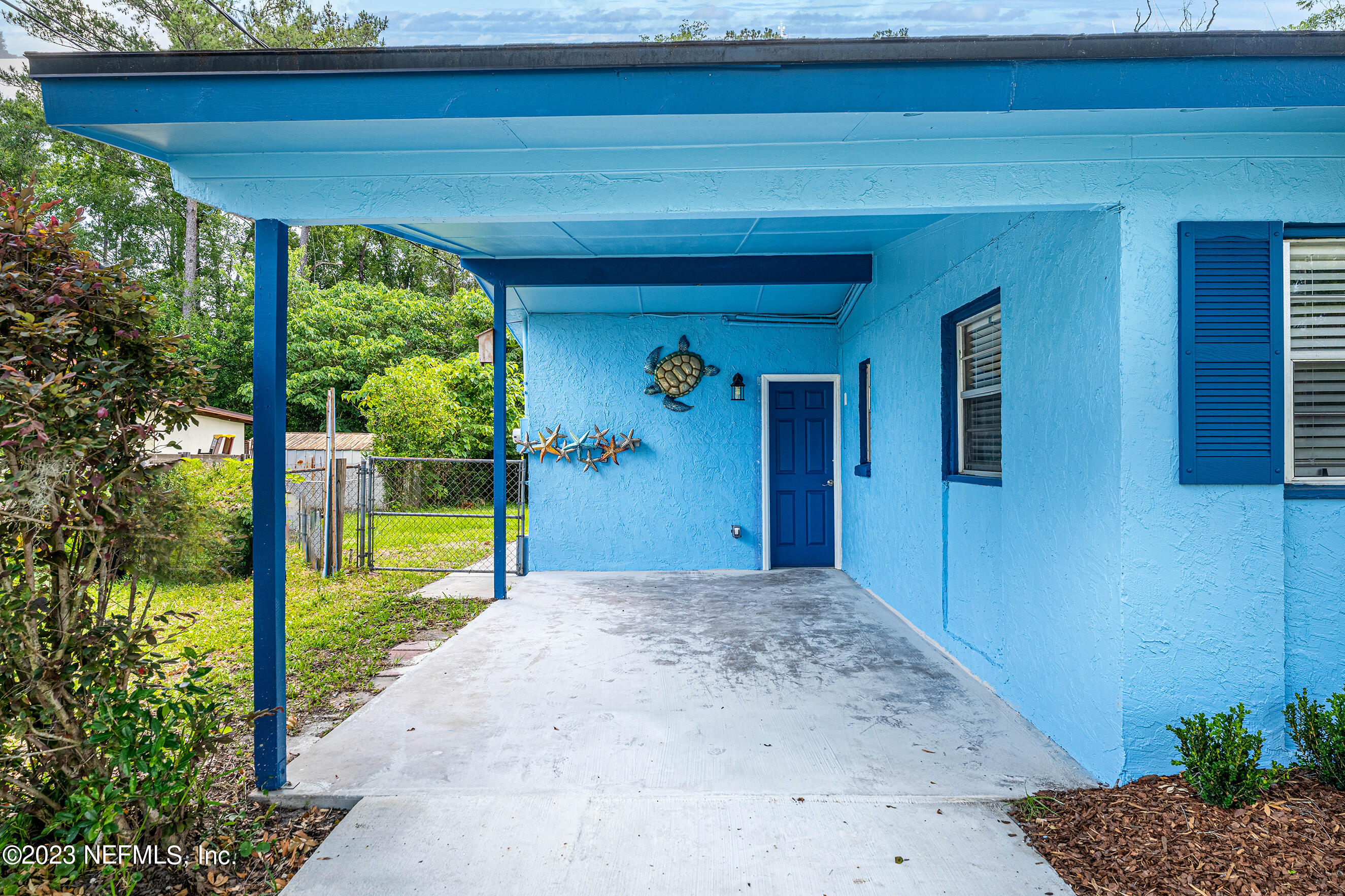 939 Westgate Drive Jacksonville, FL 32221 - Photo 30 of 31 a view of a house with a porch