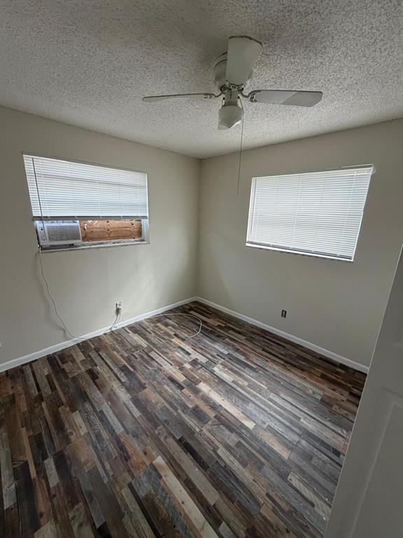 143 West 17th Street Riviera Beach, FL 33404 - Photo 2 of 13 a view of a room with wooden floor