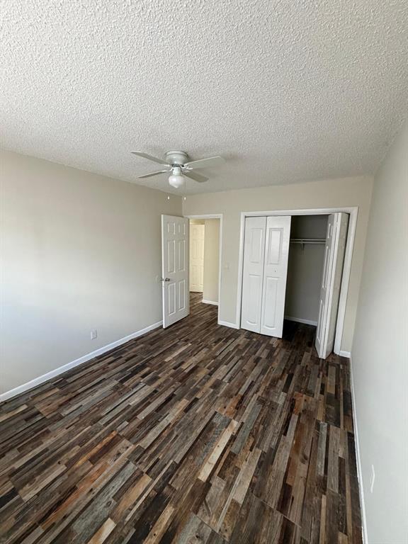 143 West 17th Street Riviera Beach, FL 33404 - Photo 3 of 13 a view of a livingroom with wooden floor and closet