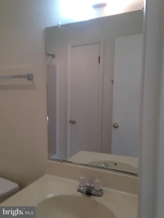 a bathroom with a sink and a vanity