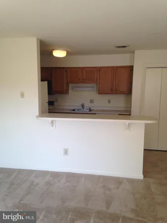 a view of kitchen cabinets