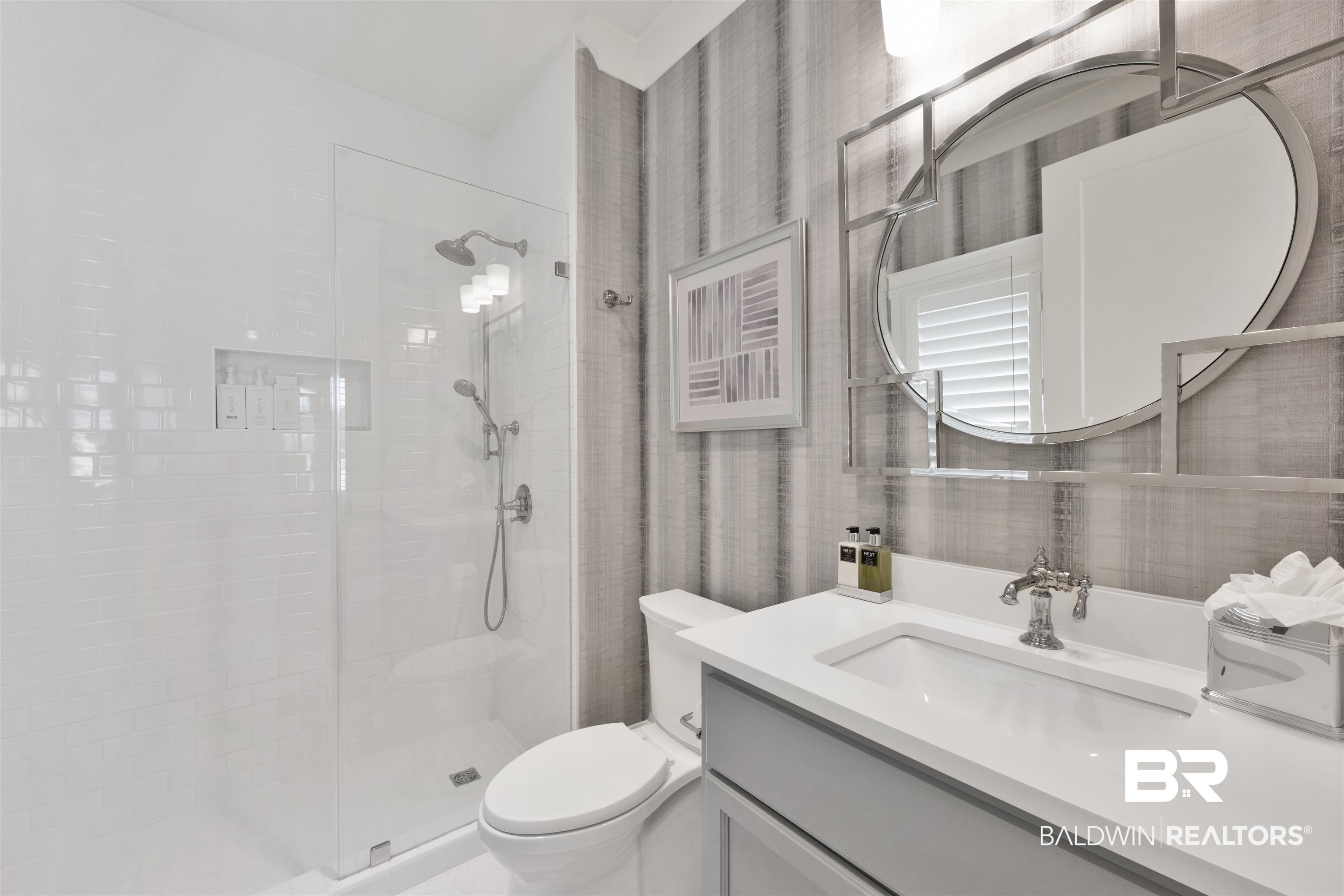 861 Inlet Circle Gulf Shores, AL 36542 - Photo 31 of 54 Full bathroom with vanity, wallpapered walls, and a walk in shower