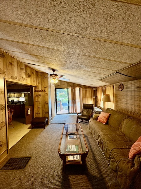 21-244 Woodhaven Sublette, IL 61367 - Photo 12 of 28 a living room with furniture and a window