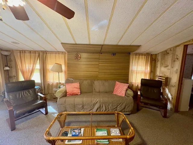 a kitchen with stainless steel appliances granite countertop a sink a stove and cabinets