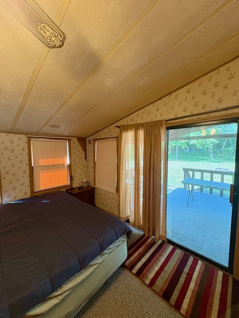 21-244 Woodhaven Sublette, IL 61367 - Photo 22 of 28 a bedroom with a bed and wooden floor