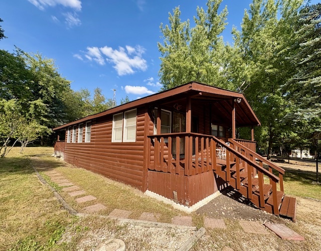 21-244 Woodhaven Sublette, IL 61367 - Photo 4 of 28 a view of a house with wooden fence