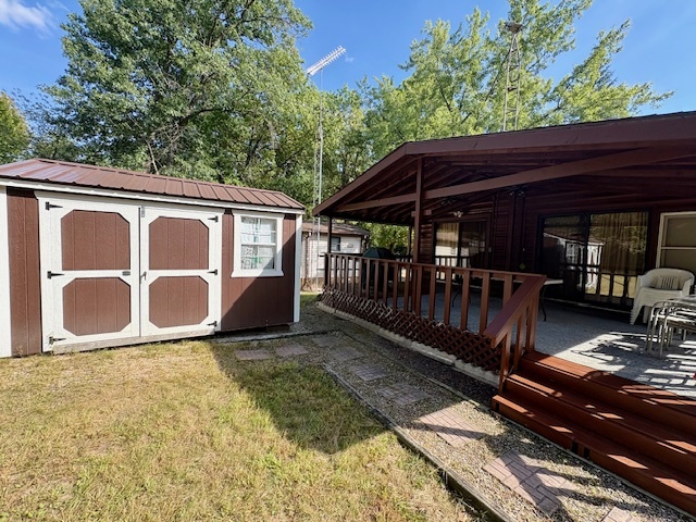 21-244 Woodhaven Sublette, IL 61367 - Photo 6 of 28 a front view of a house with garden
