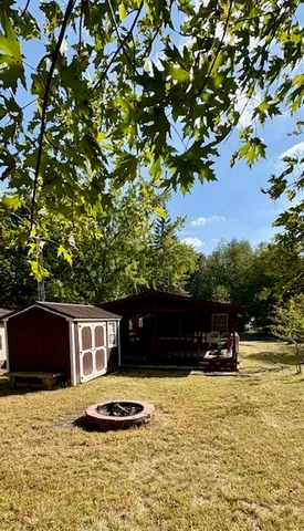 a house with trees in the background
