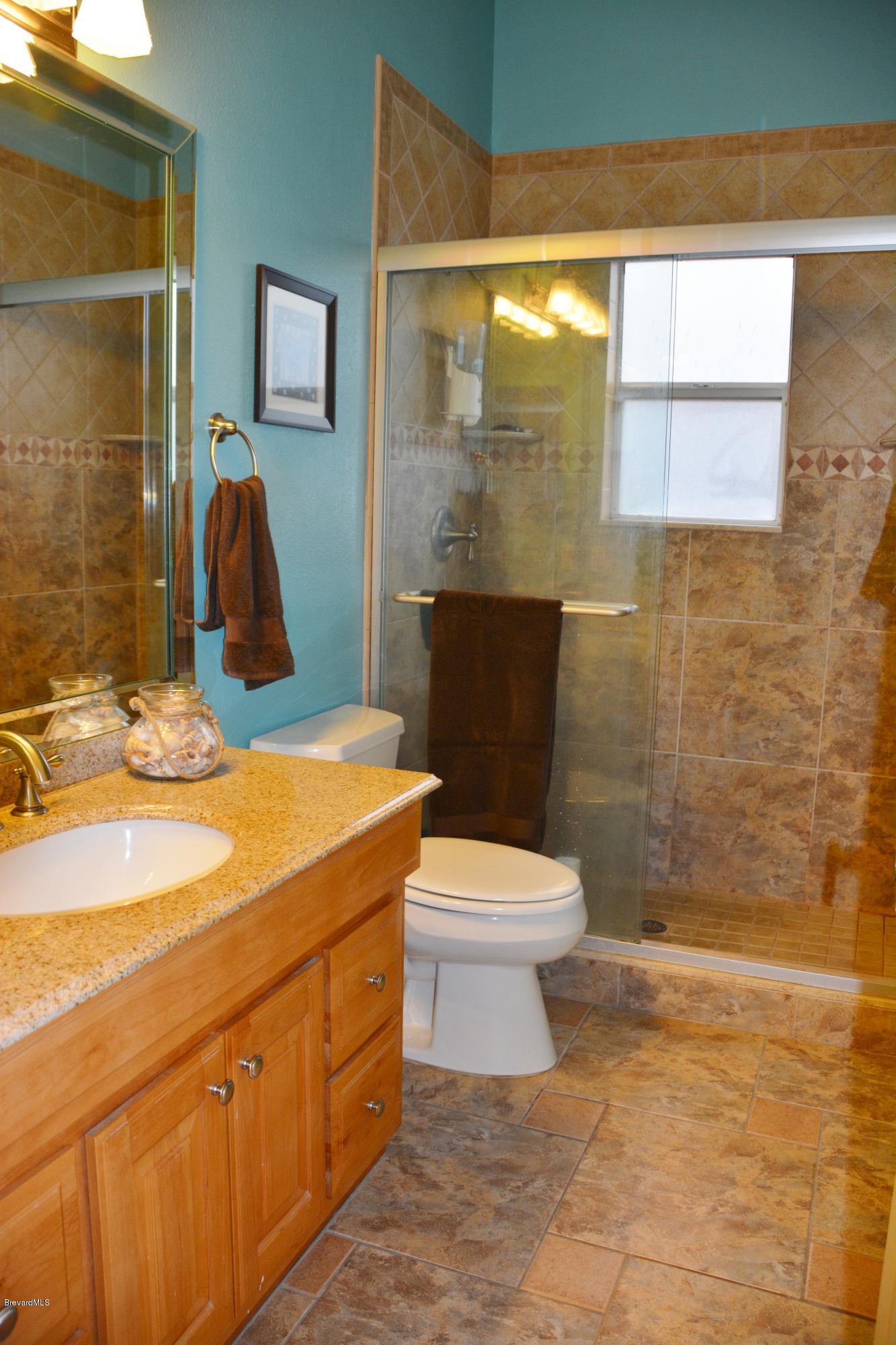 4533 Canard Road Melbourne, FL 32934 - Photo 17 of 38 Second Bathroom