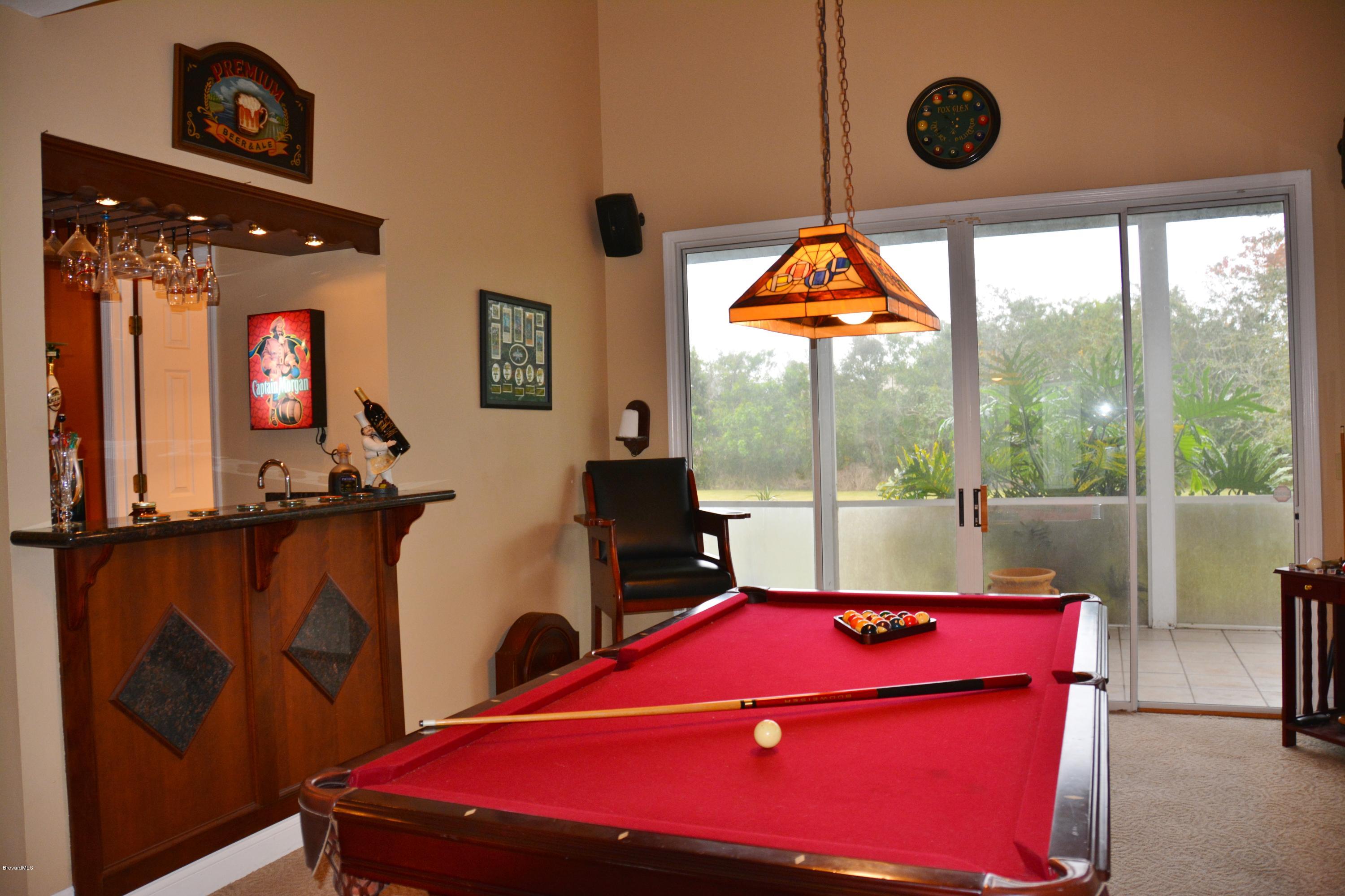 4533 Canard Road Melbourne, FL 32934 - Photo 4 of 38 Game room & Bar